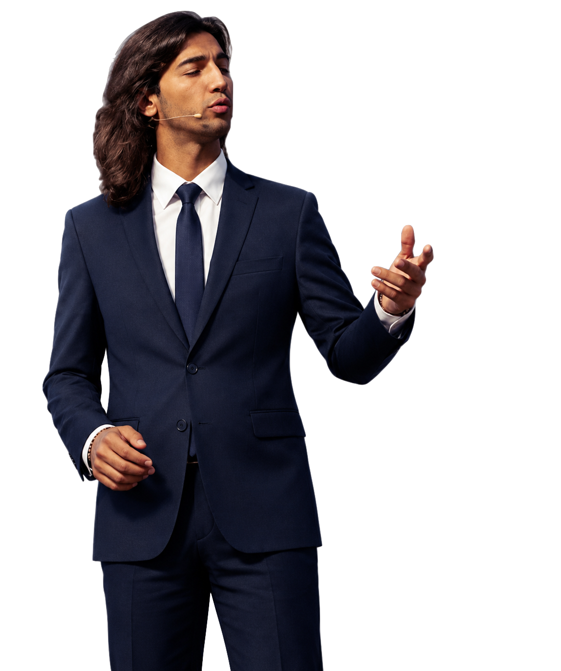Ataberk speaking on stage in a suit